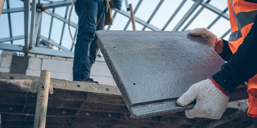 Certified Roofing Contractor Pinellas - A photo of a person building a building