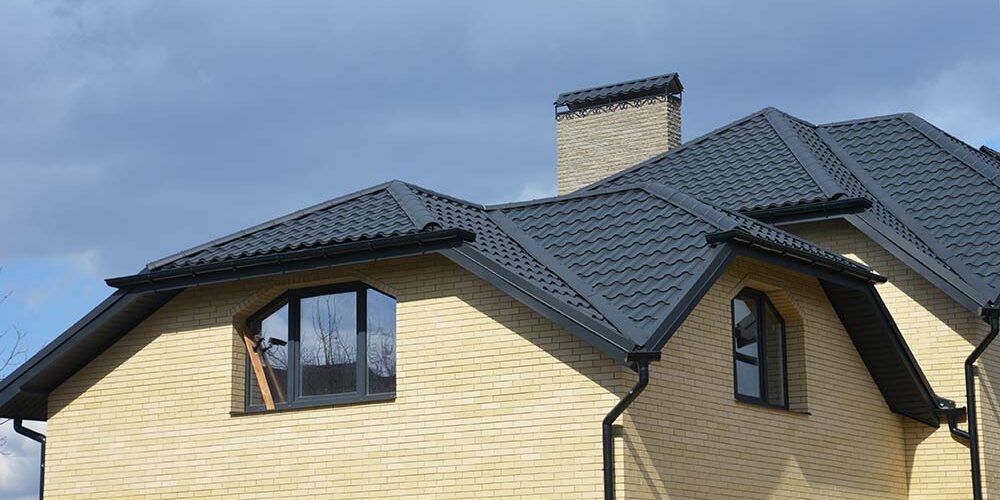 Pinellas Roofing Contractor - Photo of a house with a tile room